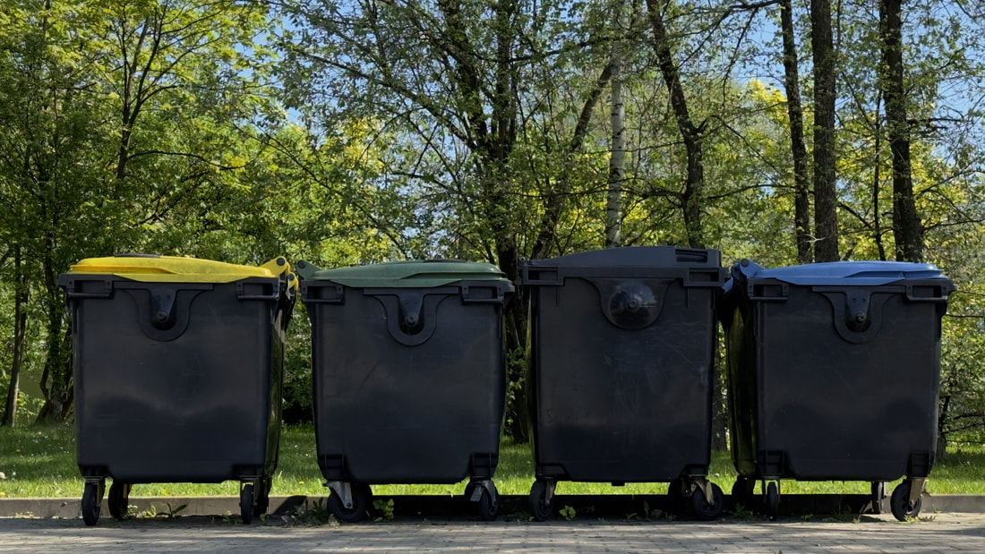 Dumpsters lined up for safe use 